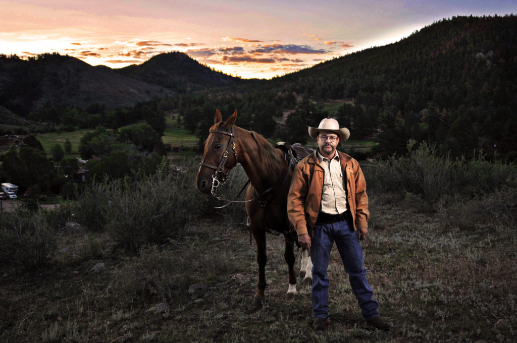 Photographer and Cowboy Jeff Julian poses for a portrait at Cherokee Park Ranch in Livermore, Colorado, July 17, 2012.